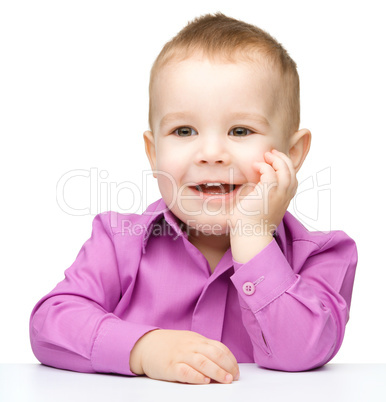 Portrait of a cute and cheerful little boy