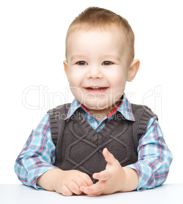 Portrait of a cute and cheerful little boy