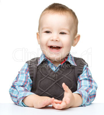 Portrait of a cute and cheerful little boy