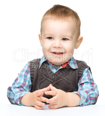 Portrait of a cute and cheerful little boy