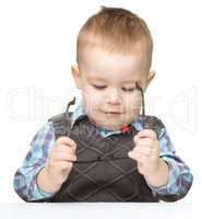 Portrait of a cute little boy wearing glasses