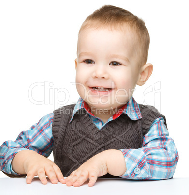 Portrait of a cute and cheerful little boy