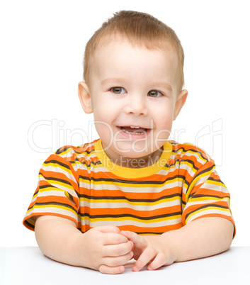 Portrait of a cute and cheerful little boy