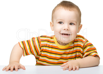 Portrait of a cute and cheerful little boy