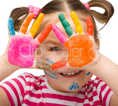 Portrait of a cute girl with painted hands