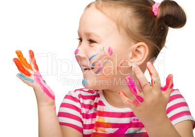 Portrait of a cute girl with painted hands