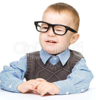 Portrait of a cute little boy wearing glasses
