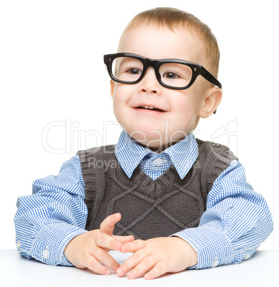 Portrait of a cute little boy wearing glasses