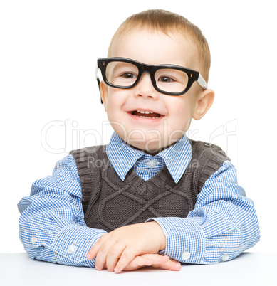 Portrait of a cute little boy wearing glasses