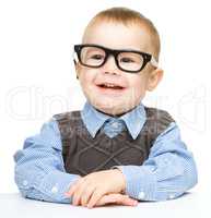 Portrait of a cute little boy wearing glasses