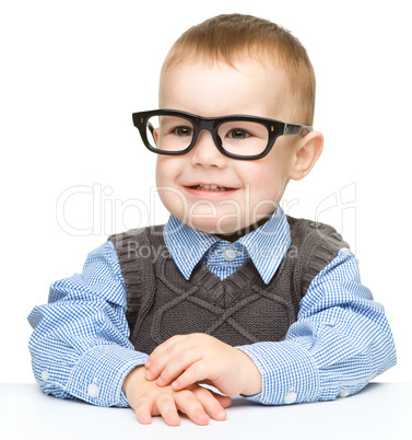 Portrait of a cute little boy wearing glasses