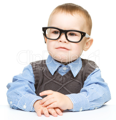 Portrait of a cute little boy wearing glasses