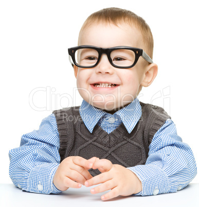 Portrait of a cute little boy wearing glasses