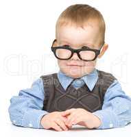 Portrait of a cute little boy wearing glasses