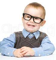 Portrait of a cute little boy wearing glasses