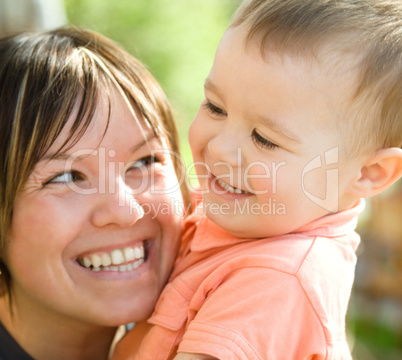 Portrait of a happy mother and her son