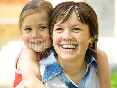 Portrait of a mother and her daughter