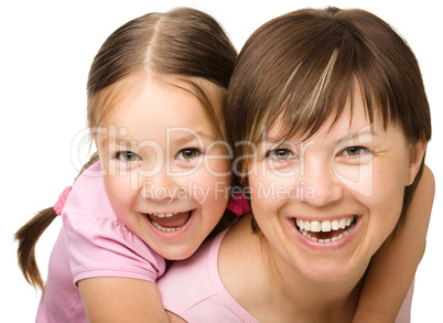 Portrait of happy daughter with mother