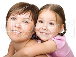 Portrait of a happy mother with her daughter