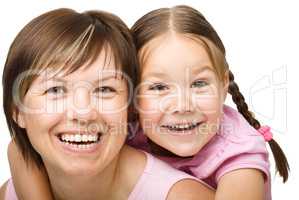 Portrait of a happy mother with her daughter