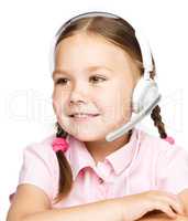 Young girl is working as an operator at helpline
