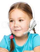 Young girl is working as an operator at helpline