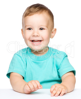 Portrait of a cute cheerful little boy