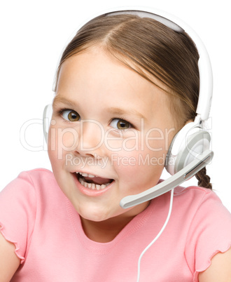 Cute little girl is talking to customers