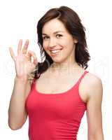 Woman is showing OK sign