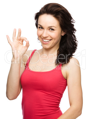 Woman is showing OK sign