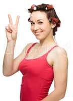 Woman is showing victory sign