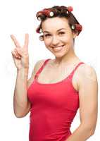 Woman is showing victory sign