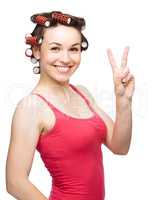 Woman is showing victory sign