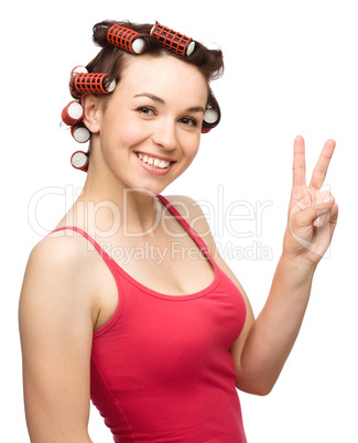 Woman is showing victory sign