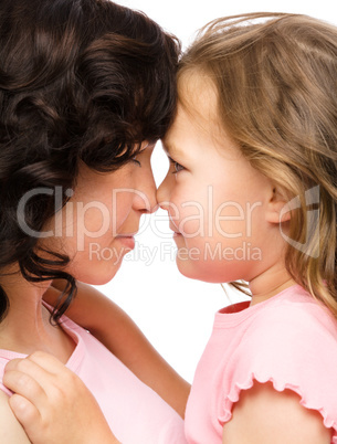 Portrait of happy daughter looking at her mother Portrait of happy daughter looking at her mother