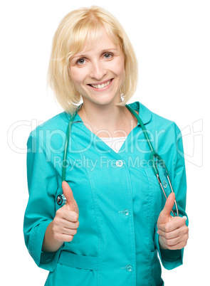 Portrait of a woman wearing doctor uniform