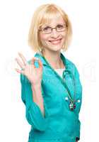 Woman doctor showing OK sign
