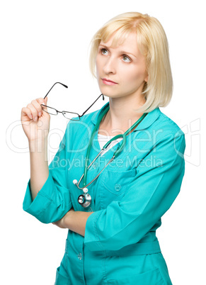 Portrait of a woman wearing doctor uniform