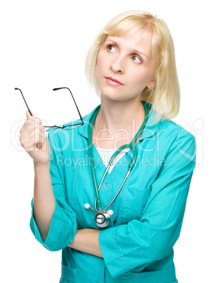 Portrait of a woman wearing doctor uniform