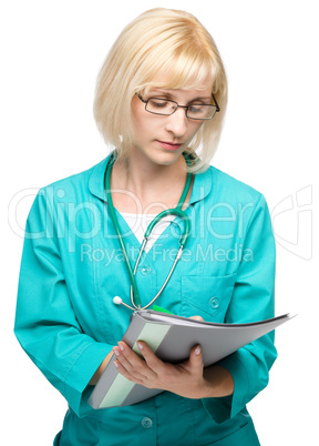 Portrait of a woman wearing doctor uniform