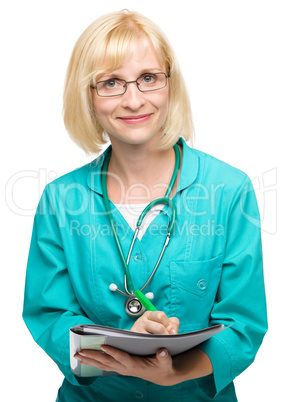 Portrait of a woman wearing doctor uniform