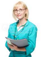 Portrait of a woman wearing doctor uniform