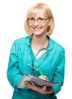 Portrait of a woman wearing doctor uniform