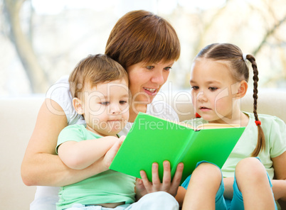 Family is reading book