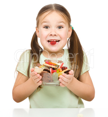 Happy girl with candies