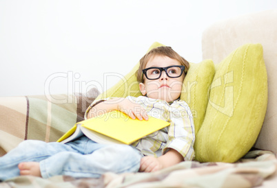 Little child with book