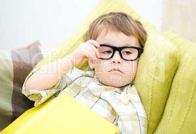 Little child with book