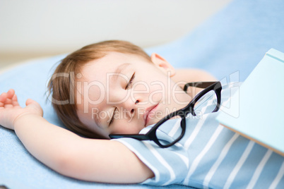 Cute little boy is sleeping