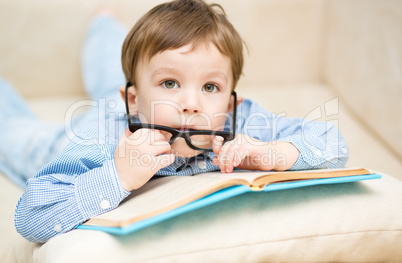 Little child with book