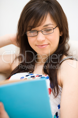 Woman is reading a book